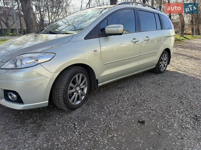 Жовтий Мазда 5, об'ємом двигуна 2 л та пробігом 238 тис. км за 6800 $, фото 7 на Automoto.ua