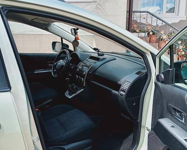 Желтый Мазда 5, объемом двигателя 2 л и пробегом 285 тыс. км за 5700 $, фото 7 на Automoto.ua