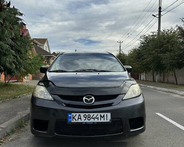 Серый Мазда 5, объемом двигателя 2.3 л и пробегом 200 тыс. км за 4900 $, фото 1 на Automoto.ua