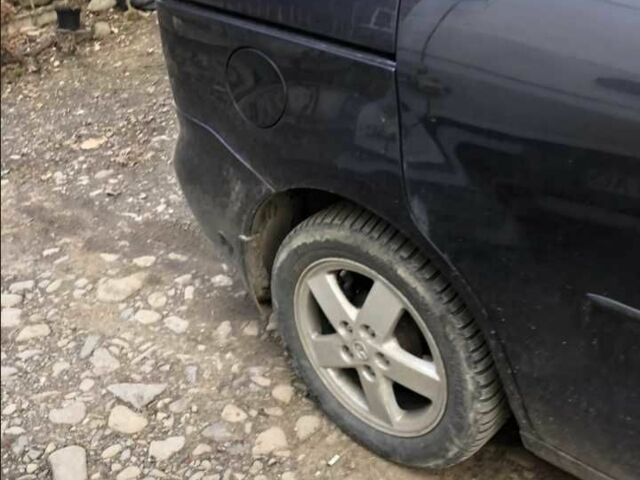 Серый Мазда 5, объемом двигателя 2 л и пробегом 280 тыс. км за 4150 $, фото 4 на Automoto.ua