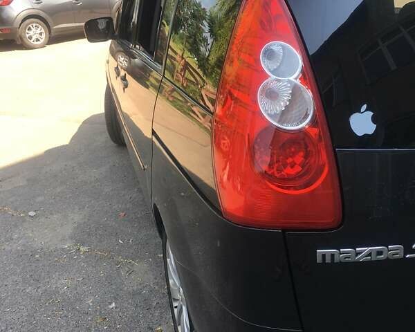 Серый Мазда 5, объемом двигателя 2 л и пробегом 235 тыс. км за 5100 $, фото 6 на Automoto.ua