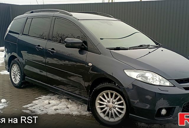 Серый Мазда 5, объемом двигателя 2 л и пробегом 330 тыс. км за 5850 $, фото 1 на Automoto.ua