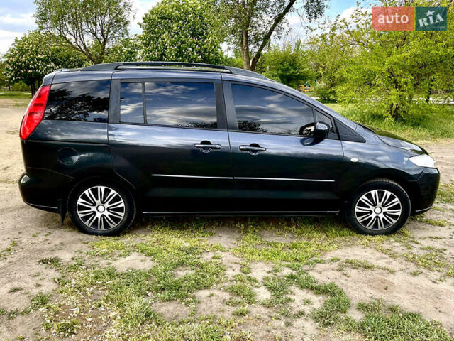 Серый Мазда 5, объемом двигателя 1.8 л и пробегом 255 тыс. км за 5450 $, фото 1 на Automoto.ua