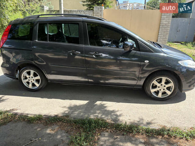 Серый Мазда 5, объемом двигателя 2 л и пробегом 255 тыс. км за 5800 $, фото 4 на Automoto.ua