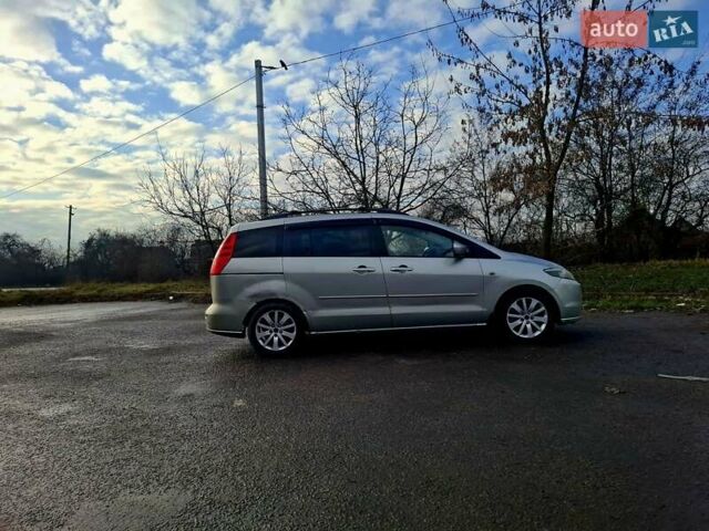 Серый Мазда 5, объемом двигателя 2 л и пробегом 150 тыс. км за 2999 $, фото 1 на Automoto.ua