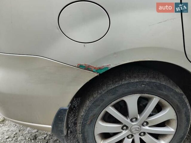 Серый Мазда 5, объемом двигателя 2 л и пробегом 297 тыс. км за 2500 $, фото 3 на Automoto.ua