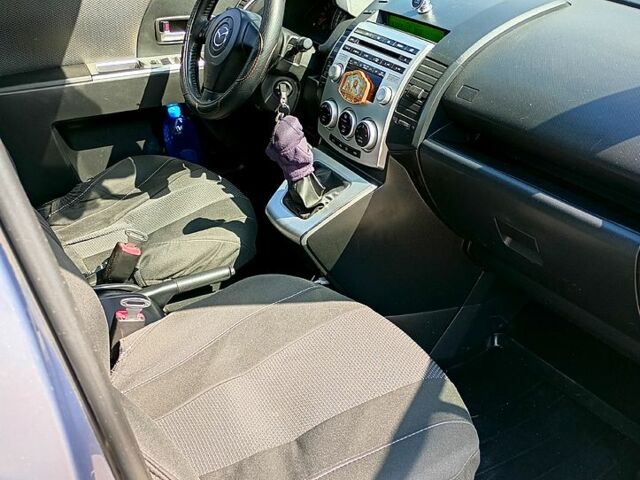 Серый Мазда 5, объемом двигателя 2 л и пробегом 330 тыс. км за 6000 $, фото 4 на Automoto.ua