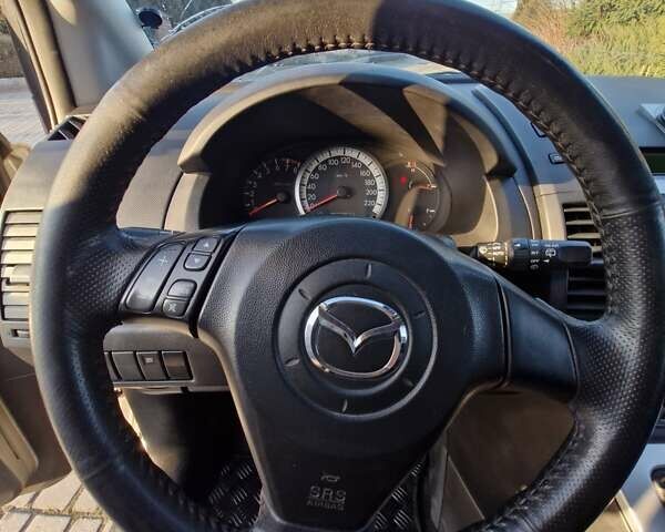 Серый Мазда 5, объемом двигателя 2 л и пробегом 200 тыс. км за 5400 $, фото 11 на Automoto.ua
