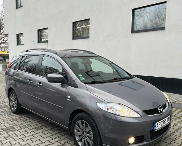 Серый Мазда 5, объемом двигателя 2 л и пробегом 205 тыс. км за 6500 $, фото 26 на Automoto.ua