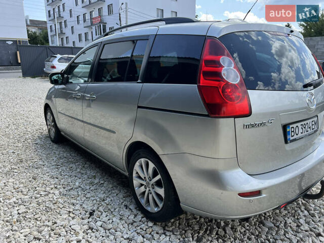 Серый Мазда 5, объемом двигателя 2 л и пробегом 263 тыс. км за 3650 $, фото 1 на Automoto.ua