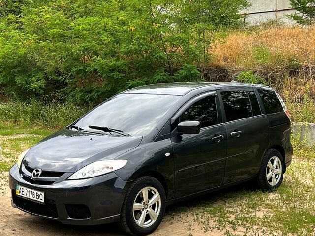 Серый Мазда 5, объемом двигателя 2.3 л и пробегом 257 тыс. км за 5700 $, фото 1 на Automoto.ua