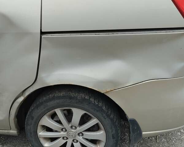 Серый Мазда 5, объемом двигателя 2 л и пробегом 297 тыс. км за 2500 $, фото 2 на Automoto.ua