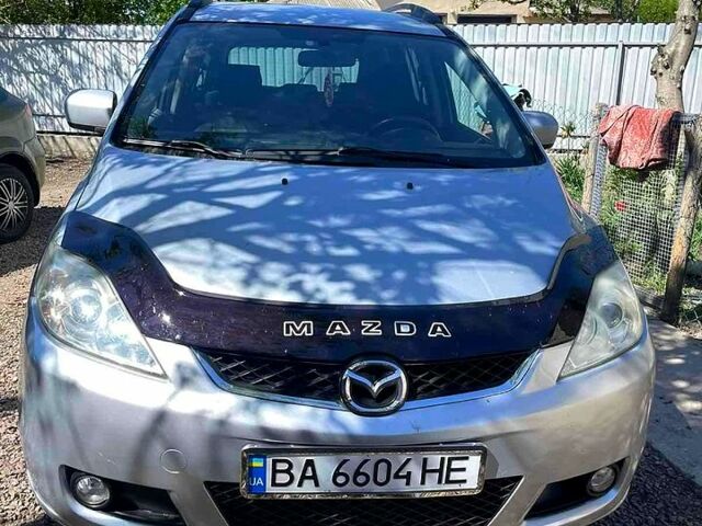 Серый Мазда 5, объемом двигателя 2 л и пробегом 264 тыс. км за 4799 $, фото 4 на Automoto.ua