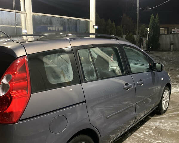 Серый Мазда 5, объемом двигателя 1.8 л и пробегом 285 тыс. км за 4500 $, фото 1 на Automoto.ua