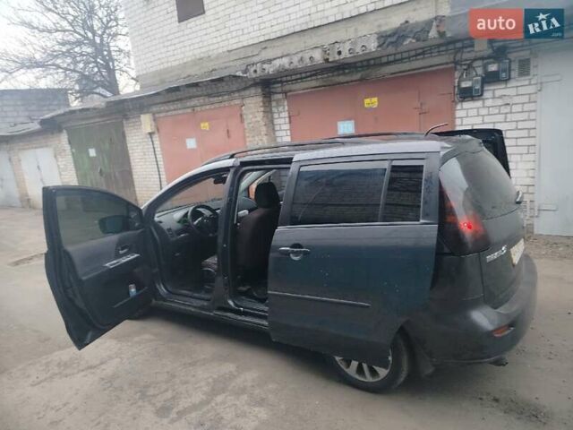 Серый Мазда 5, объемом двигателя 2 л и пробегом 423 тыс. км за 4300 $, фото 32 на Automoto.ua