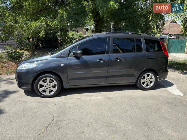 Серый Мазда 5, объемом двигателя 2 л и пробегом 255 тыс. км за 5800 $, фото 2 на Automoto.ua