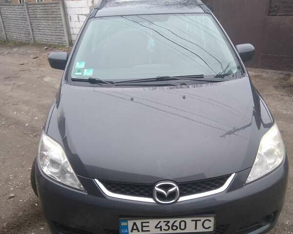 Серый Мазда 5, объемом двигателя 2 л и пробегом 163 тыс. км за 6500 $, фото 4 на Automoto.ua
