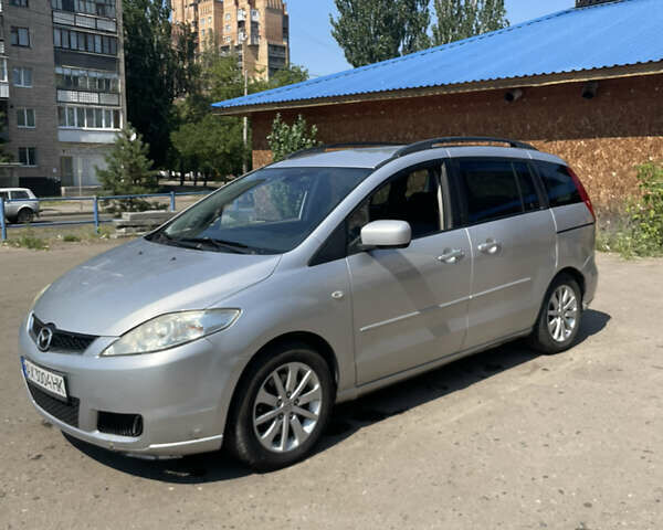 Серый Мазда 5, объемом двигателя 2 л и пробегом 311 тыс. км за 4399 $, фото 1 на Automoto.ua