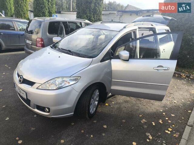 Серый Мазда 5, объемом двигателя 2 л и пробегом 295 тыс. км за 5650 $, фото 9 на Automoto.ua