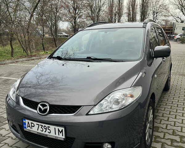 Серый Мазда 5, объемом двигателя 2 л и пробегом 205 тыс. км за 6500 $, фото 4 на Automoto.ua