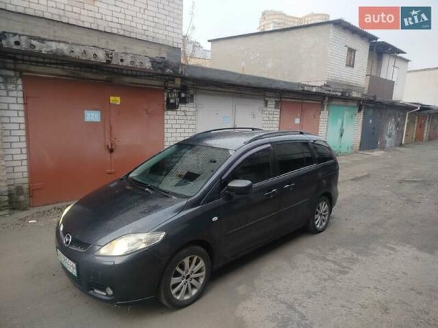 Серый Мазда 5, объемом двигателя 2 л и пробегом 423 тыс. км за 4300 $, фото 1 на Automoto.ua