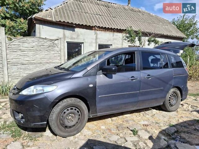 Сірий Мазда 5, об'ємом двигуна 2.3 л та пробігом 200 тис. км за 3900 $, фото 1 на Automoto.ua