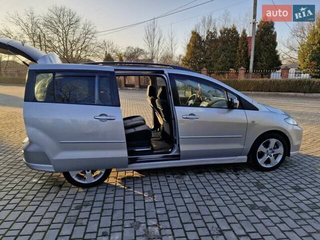 Серый Мазда 5, объемом двигателя 2 л и пробегом 200 тыс. км за 5400 $, фото 2 на Automoto.ua