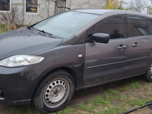 Серый Мазда 5, объемом двигателя 2.3 л и пробегом 230 тыс. км за 3500 $, фото 1 на Automoto.ua