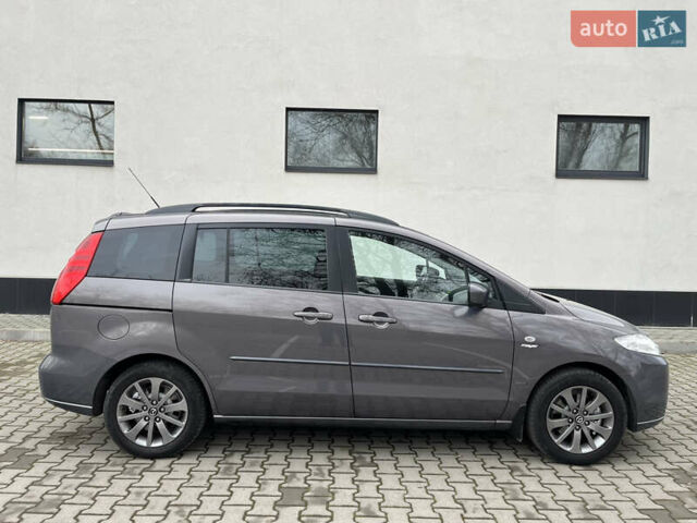 Серый Мазда 5, объемом двигателя 2 л и пробегом 205 тыс. км за 6500 $, фото 6 на Automoto.ua