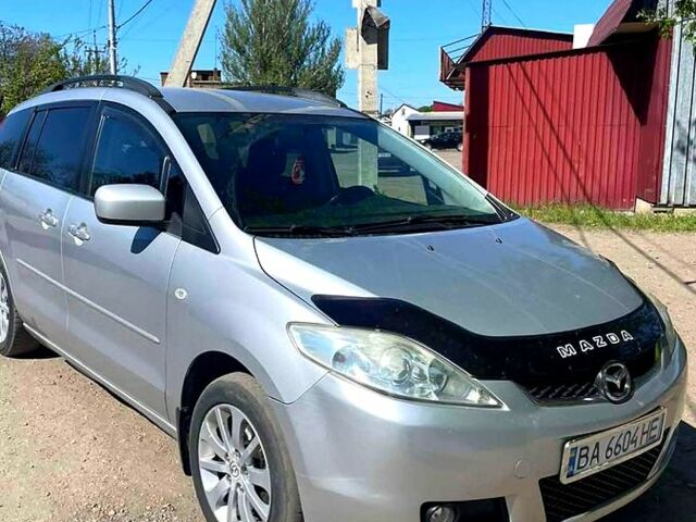 Серый Мазда 5, объемом двигателя 2 л и пробегом 264 тыс. км за 4799 $, фото 2 на Automoto.ua