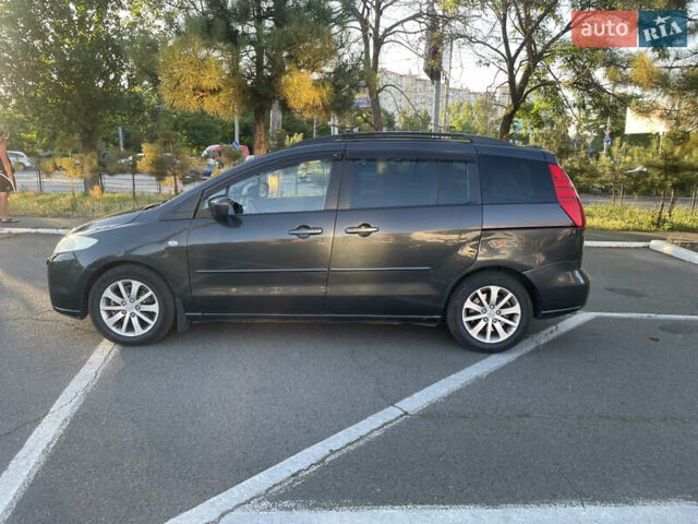 Серый Мазда 5, объемом двигателя 2 л и пробегом 246 тыс. км за 5400 $, фото 1 на Automoto.ua