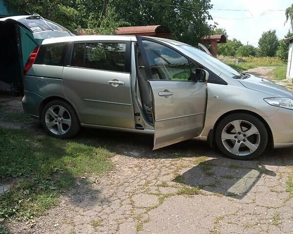 Серый Мазда 5, объемом двигателя 1.8 л и пробегом 213 тыс. км за 5548 $, фото 3 на Automoto.ua