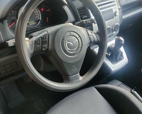 Серый Мазда 5, объемом двигателя 2 л и пробегом 334 тыс. км за 4500 $, фото 2 на Automoto.ua