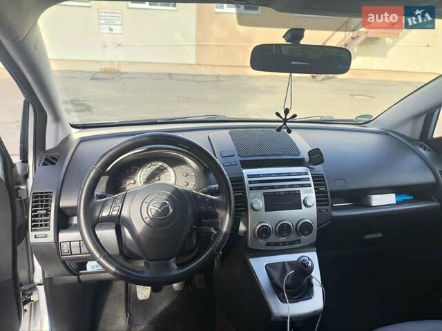 Серый Мазда 5, объемом двигателя 2 л и пробегом 295 тыс. км за 5650 $, фото 2 на Automoto.ua