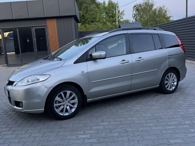 Серый Мазда 5, объемом двигателя 2 л и пробегом 206 тыс. км за 4800 $, фото 2 на Automoto.ua