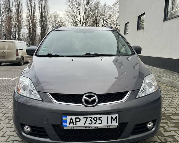 Серый Мазда 5, объемом двигателя 2 л и пробегом 205 тыс. км за 6500 $, фото 1 на Automoto.ua