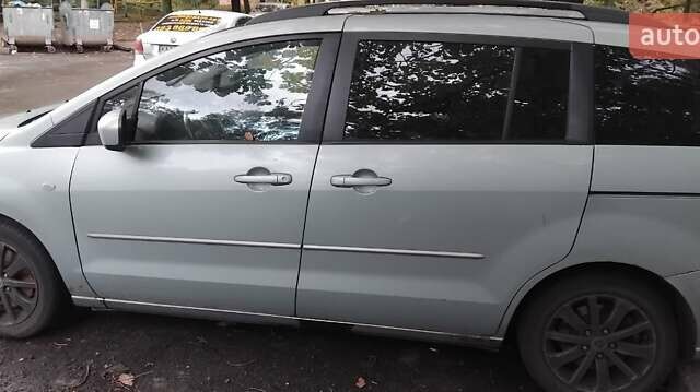 Сірий Мазда 5, об'ємом двигуна 2 л та пробігом 235 тис. км за 3500 $, фото 1 на Automoto.ua