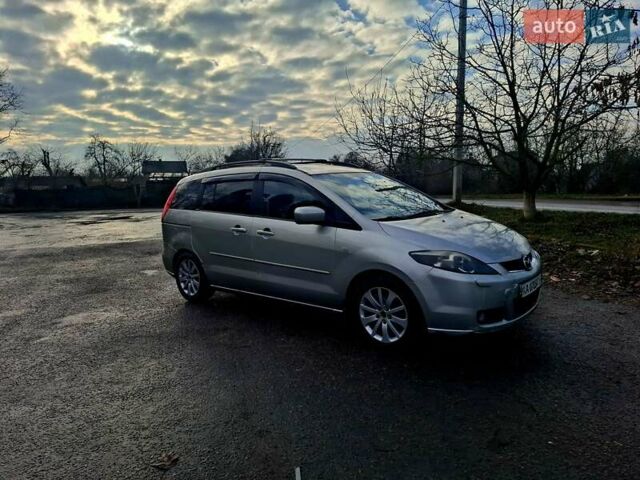 Серый Мазда 5, объемом двигателя 2 л и пробегом 150 тыс. км за 2999 $, фото 3 на Automoto.ua