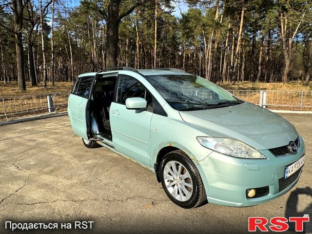 Серый Мазда 5, объемом двигателя 2 л и пробегом 218 тыс. км за 4400 $, фото 2 на Automoto.ua