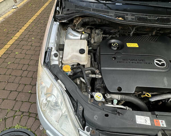 Сірий Мазда 5, об'ємом двигуна 2.01 л та пробігом 228 тис. км за 4950 $, фото 16 на Automoto.ua