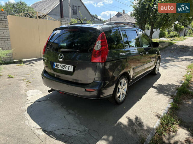 Серый Мазда 5, объемом двигателя 2 л и пробегом 255 тыс. км за 5800 $, фото 5 на Automoto.ua