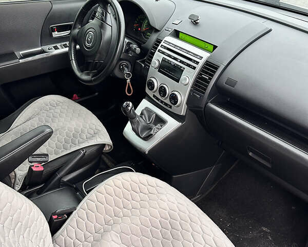 Серый Мазда 5, объемом двигателя 2 л и пробегом 211 тыс. км за 5680 $, фото 15 на Automoto.ua