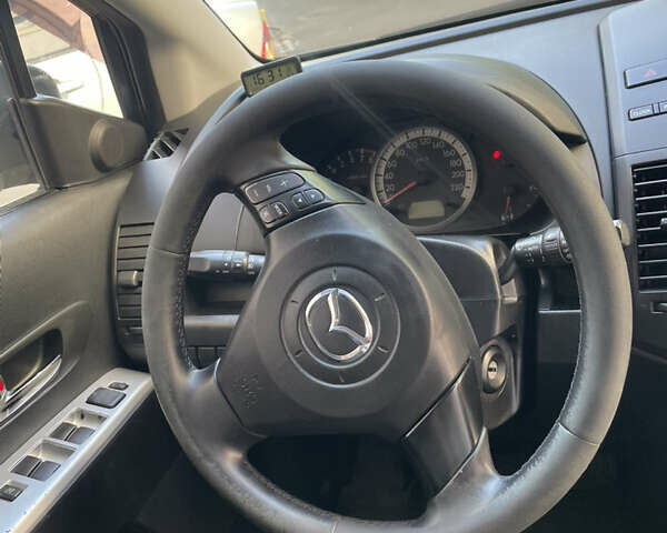 Серый Мазда 5, объемом двигателя 2 л и пробегом 246 тыс. км за 5400 $, фото 4 на Automoto.ua