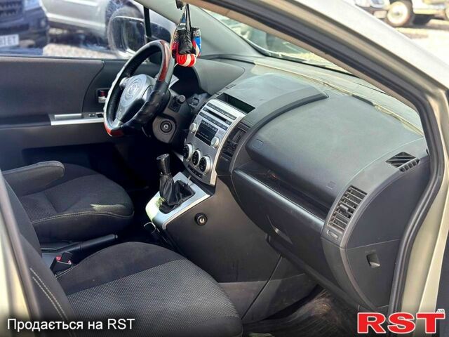 Серый Мазда 5, объемом двигателя 2 л и пробегом 260 тыс. км за 2699 $, фото 5 на Automoto.ua
