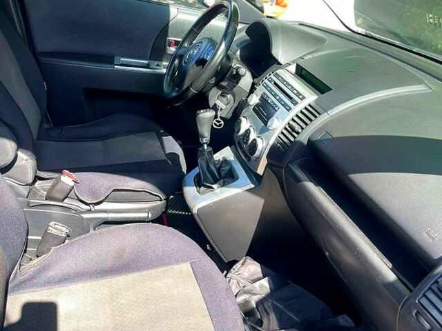 Серый Мазда 5, объемом двигателя 2 л и пробегом 264 тыс. км за 4799 $, фото 1 на Automoto.ua