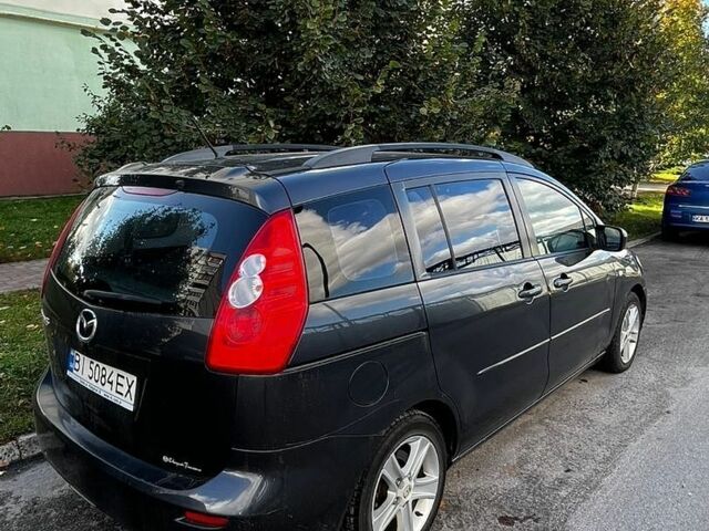 Серый Мазда 5, объемом двигателя 2 л и пробегом 280 тыс. км за 4600 $, фото 4 на Automoto.ua