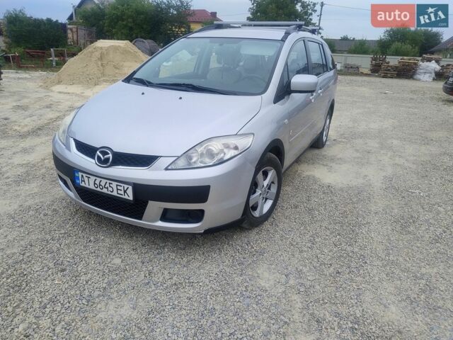 Серый Мазда 5, объемом двигателя 2 л и пробегом 210 тыс. км за 4499 $, фото 1 на Automoto.ua