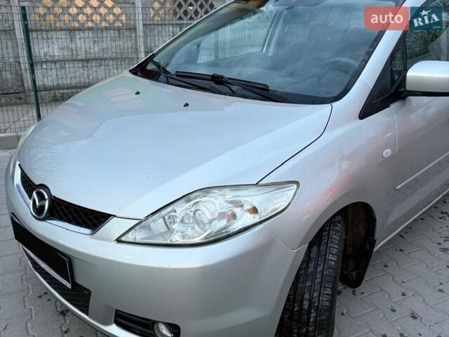 Серый Мазда 5, объемом двигателя 2 л и пробегом 288 тыс. км за 4900 $, фото 1 на Automoto.ua