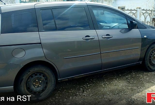 Серый Мазда 5, объемом двигателя 2.3 л и пробегом 200 тыс. км за 4200 $, фото 2 на Automoto.ua
