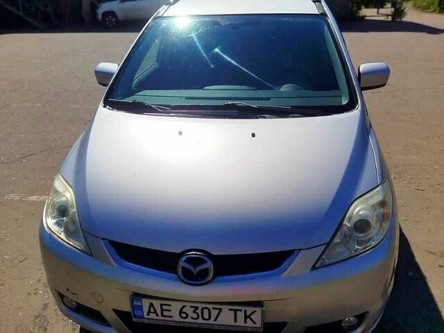 Серый Мазда 5, объемом двигателя 1.8 л и пробегом 251 тыс. км за 5500 $, фото 1 на Automoto.ua